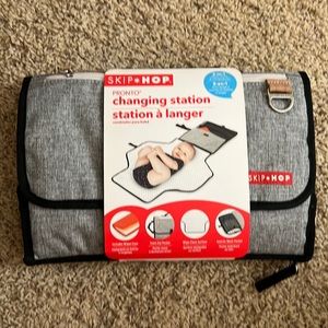 Baby changing station brand new w/tags
